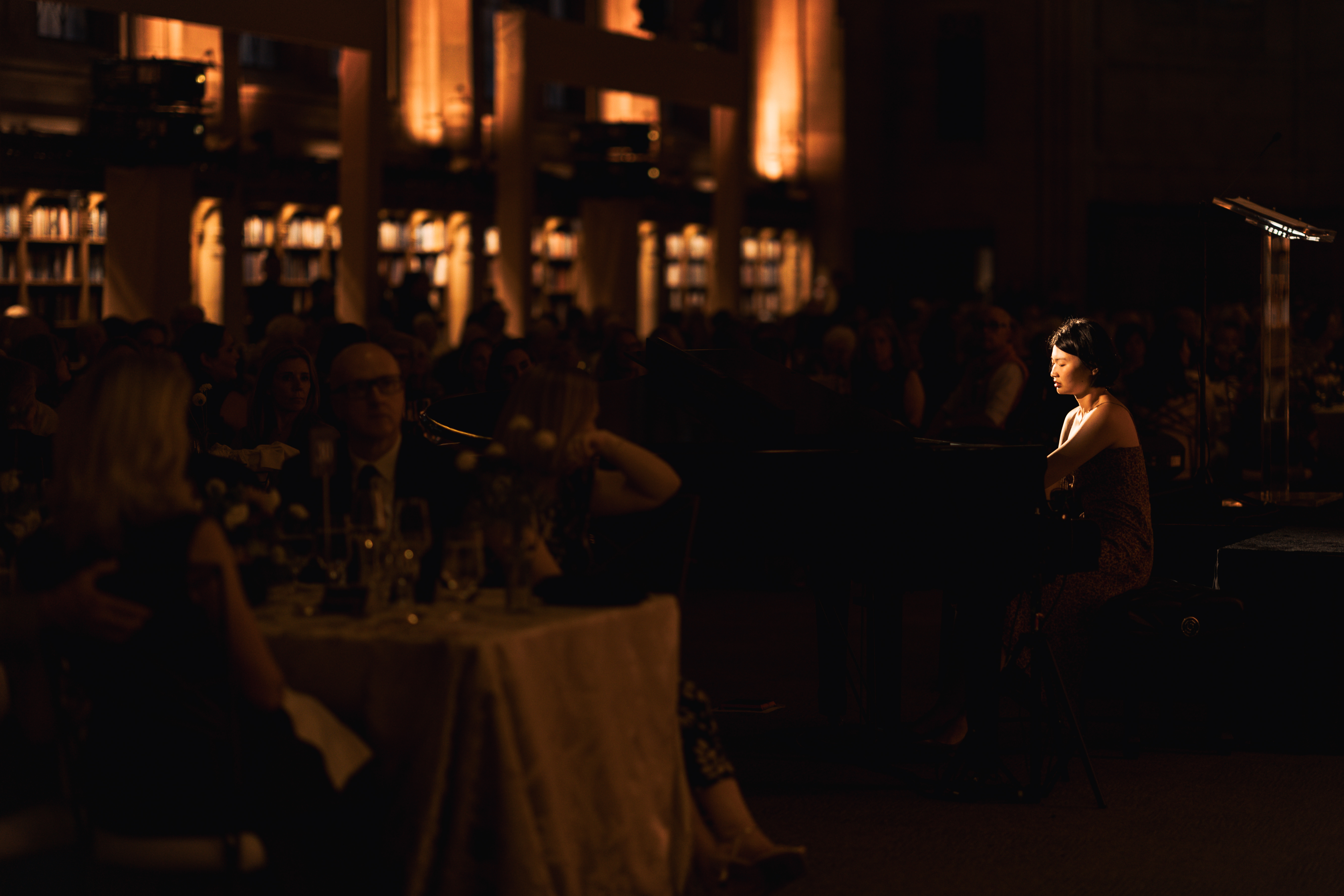 Cicy Li smiling at piano